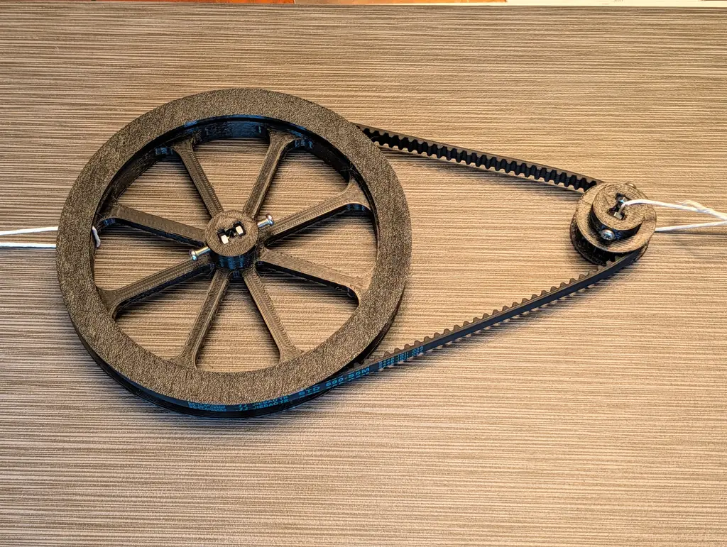 The printed 100-tooth, eight-spoke STD 5M wheel driven by the 20-tooth pulley on an S5M 690 belt
